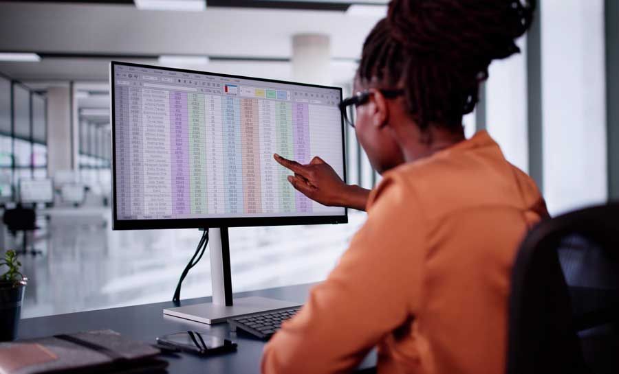A fleet manager reviews data from her fleets’ fuel card usage.